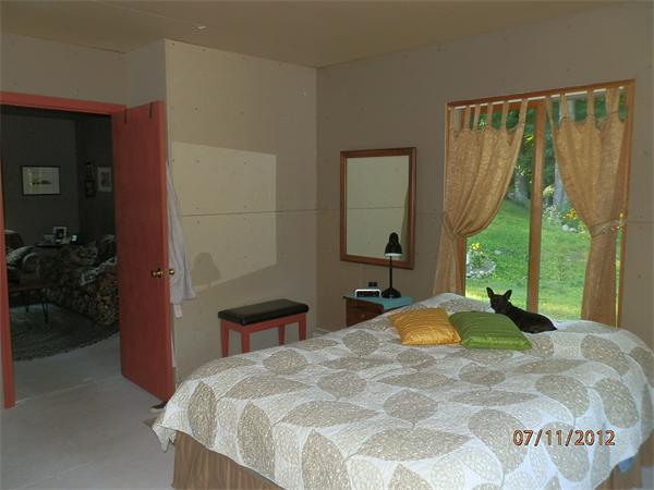 315 Dana Road Barre, MA 01005 - Photo 3 of 6 a bedroom with a bed and a large window