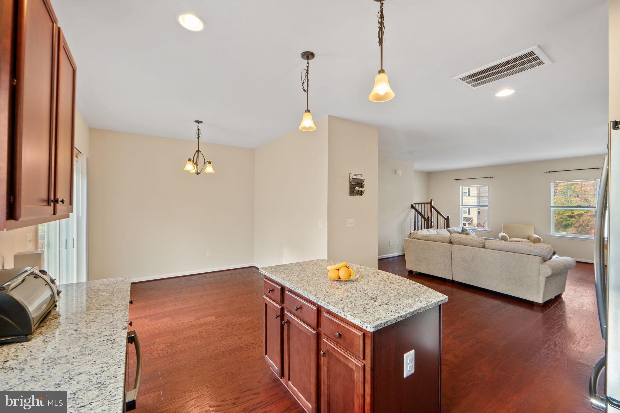 2210 Mallard Landing Drive Fredericksburg, VA 22408 - Photo 14 of 30 a living room with furniture and wooden floor