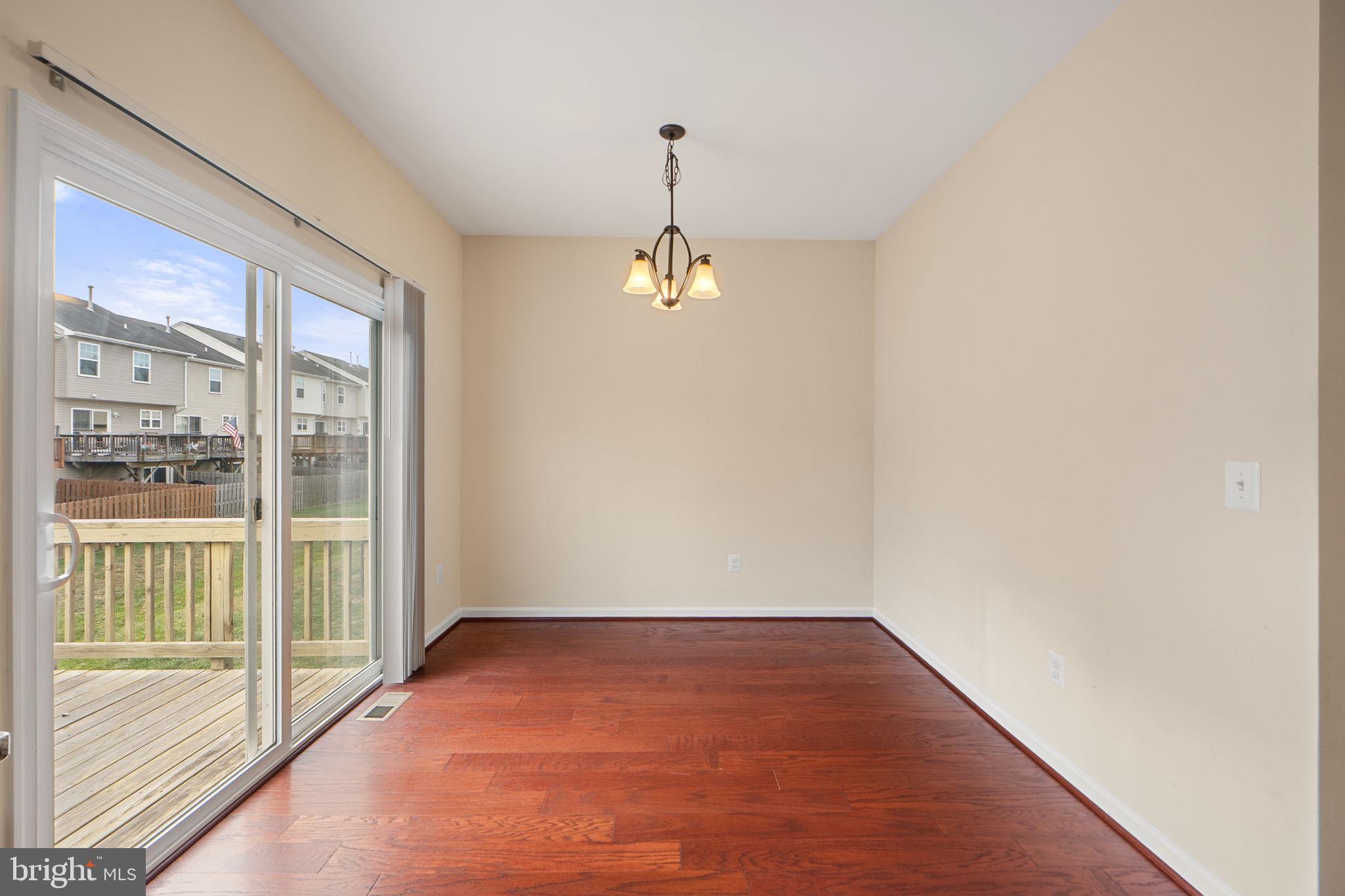 2210 Mallard Landing Drive Fredericksburg, VA 22408 - Photo 15 of 30 a view of a room with wooden floor and windows