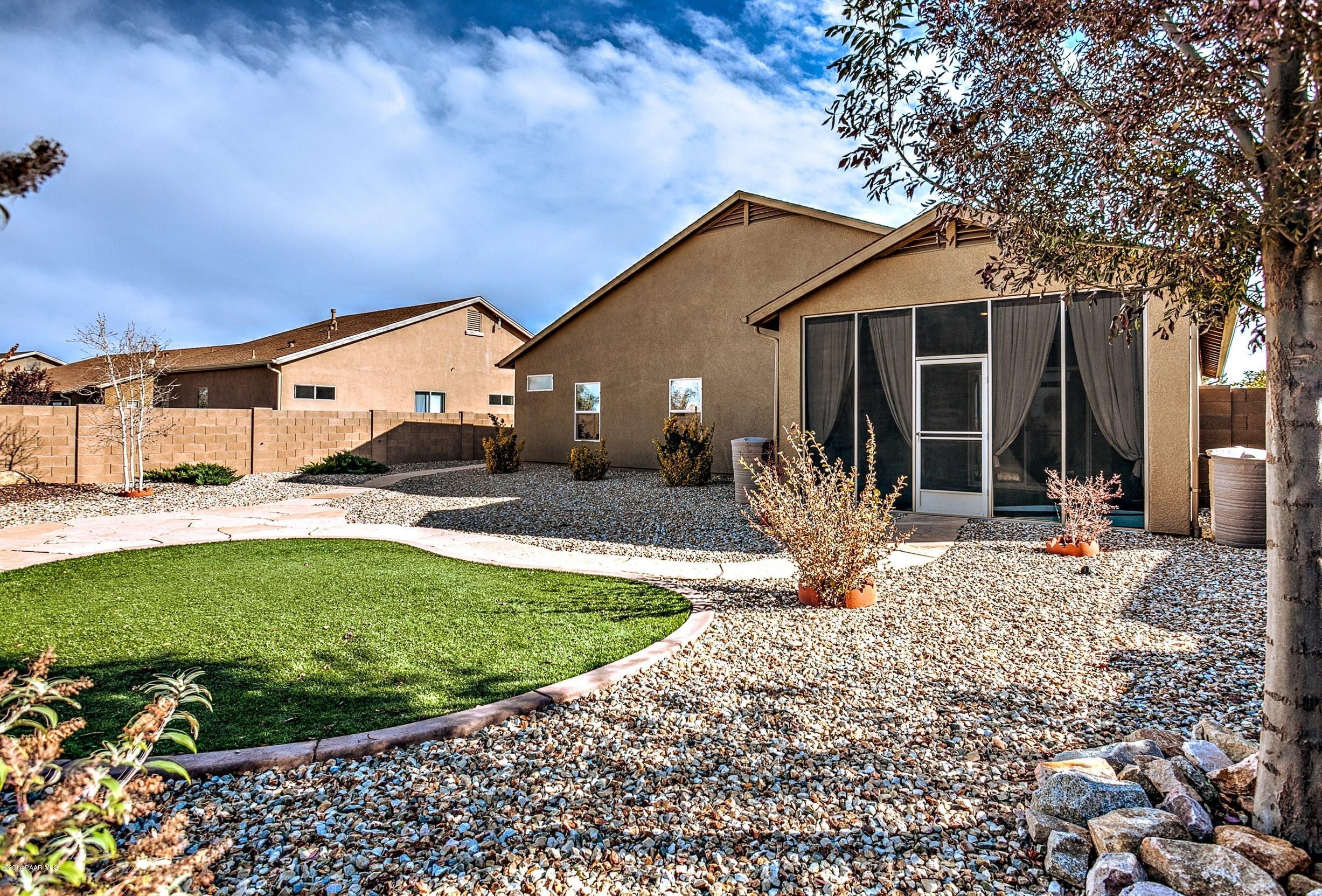 4728 Edgemont Road Prescott Valley, AZ 86314 - Photo 16 of 17 a front view of a house with garden