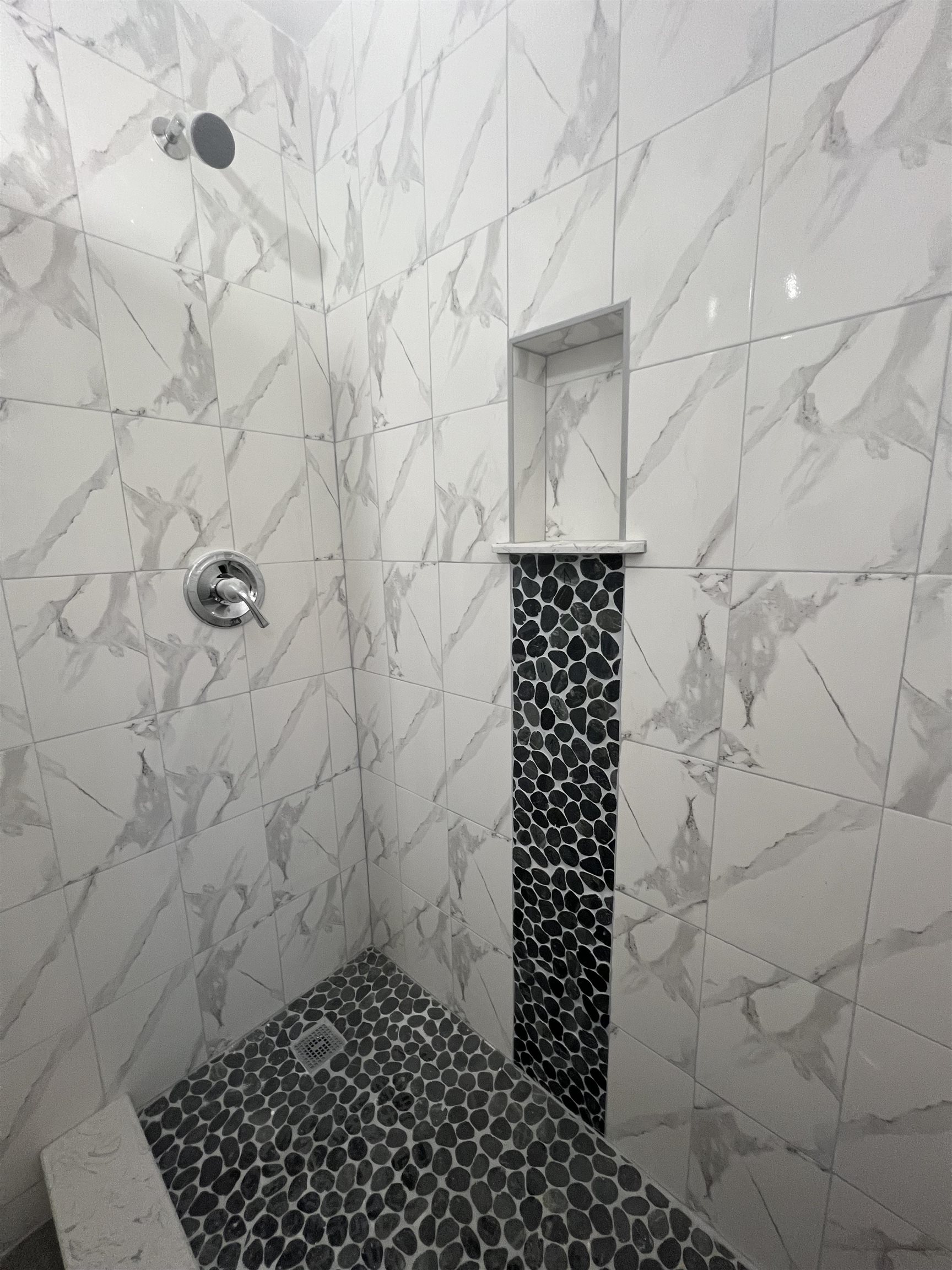 165 Vroom Street, Unit 1F Jersey City, NJ 07306 - Photo 11 of 11 a bathroom with a shower