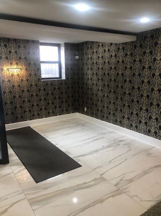 165 Vroom Street, Unit 1F Jersey City, NJ 07306 - Photo 3 of 11 a view of wooden floor