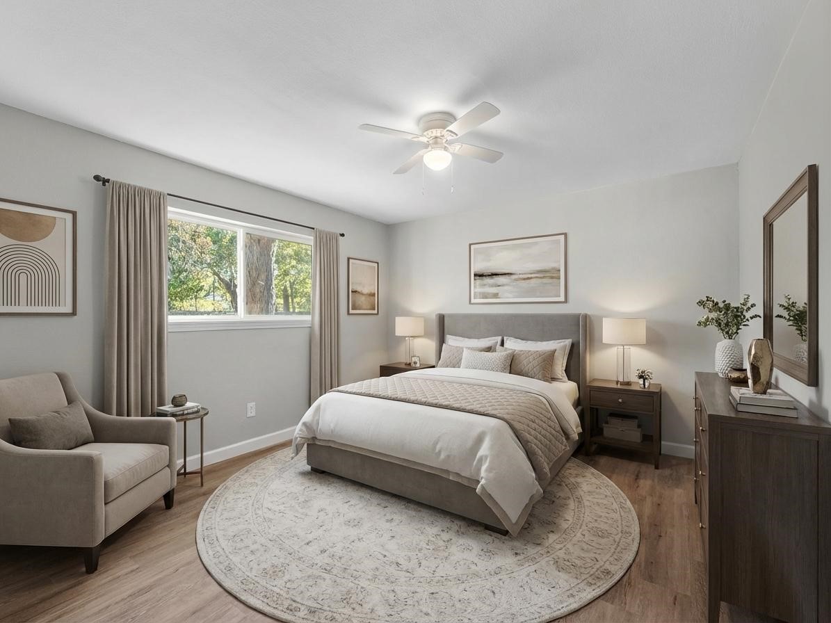 609 Debbie Lane Alvin, TX 77511 - Photo 20 of 32 a bedroom with a bed couch and window