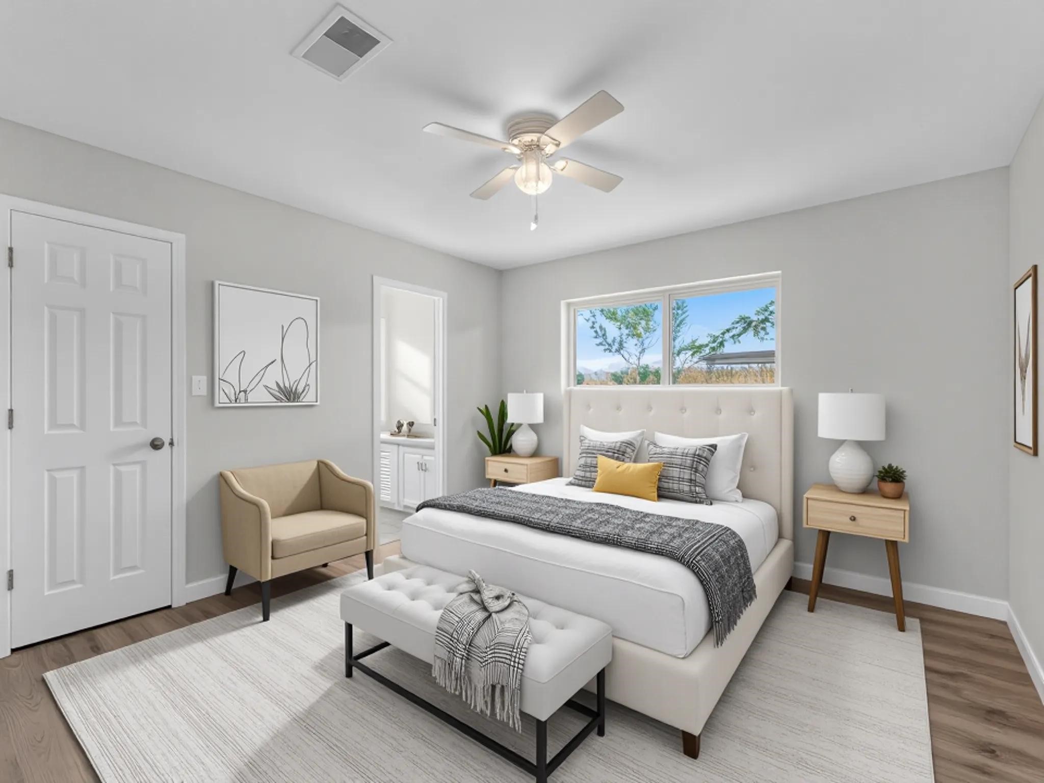 609 Debbie Lane Alvin, TX 77511 - Photo 10 of 32 a bedroom with a bed and a chandelier