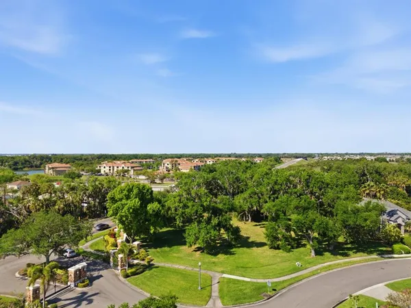a view of a golf course with a lake