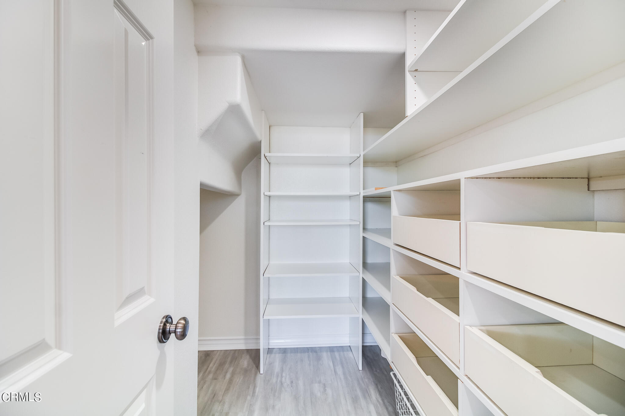 13625 Silver Oak Lane Moorpark, CA 93021 - Photo 9 of 44 a view of walk in closet with empty racks