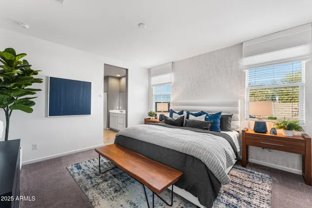 a bathroom with a shower sink and mirror
