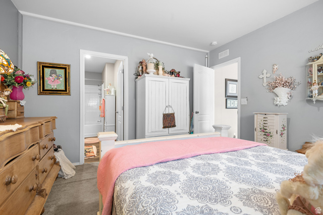 150 West 7500th South, Unit 13 Midvale, UT 84047 - Photo 16 of 32 Bedroom featuring light gray walls and white trim