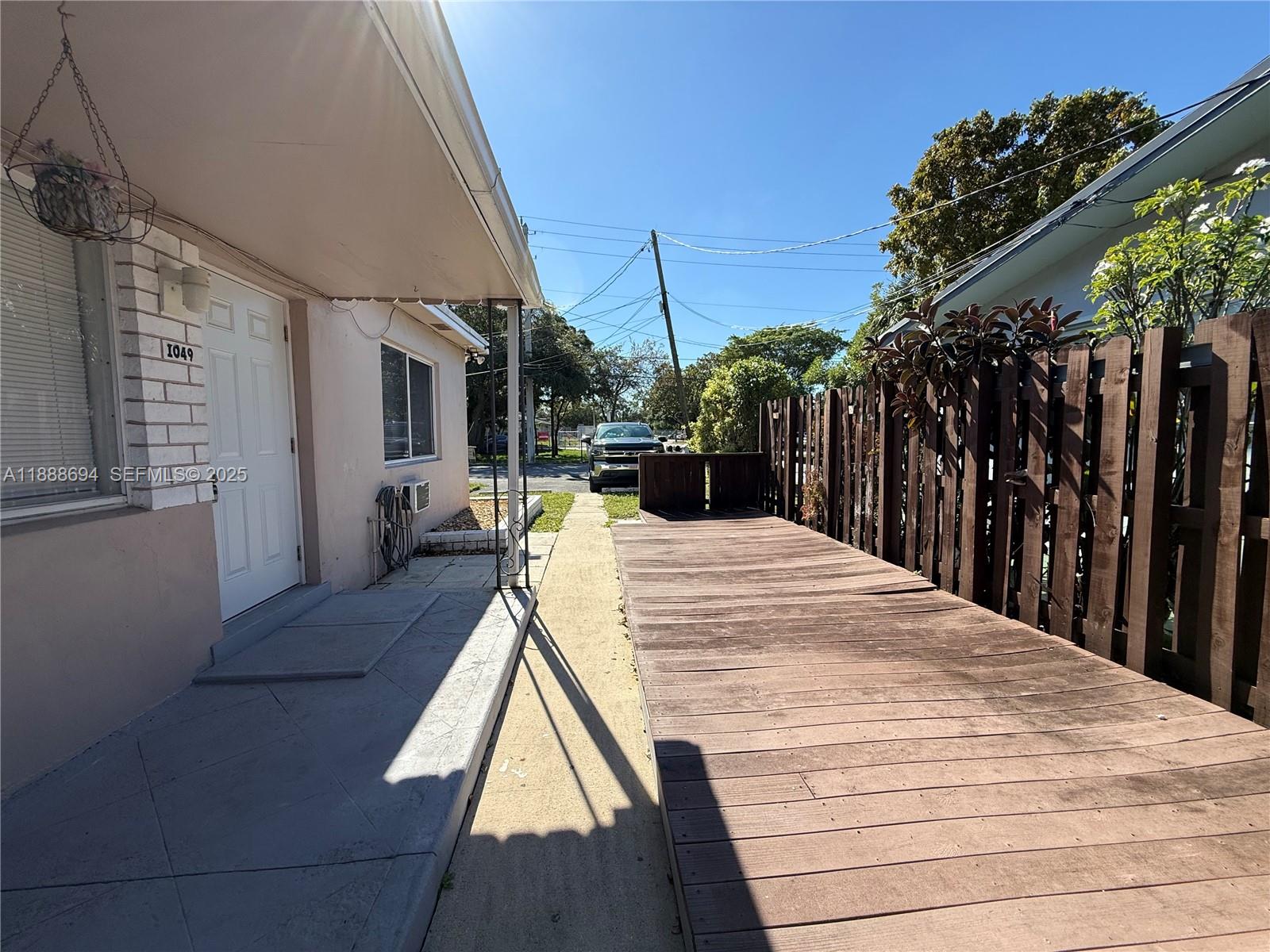 1049 Southwest 3rd Street Hallandale Beach, FL 33009 - Photo 13 of 15 a view of outdoor space with seating space