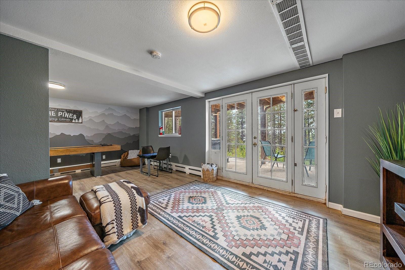 136 Nebraska Drive Idaho Springs, CO 80452 - Photo 18 of 29 a living room with furniture