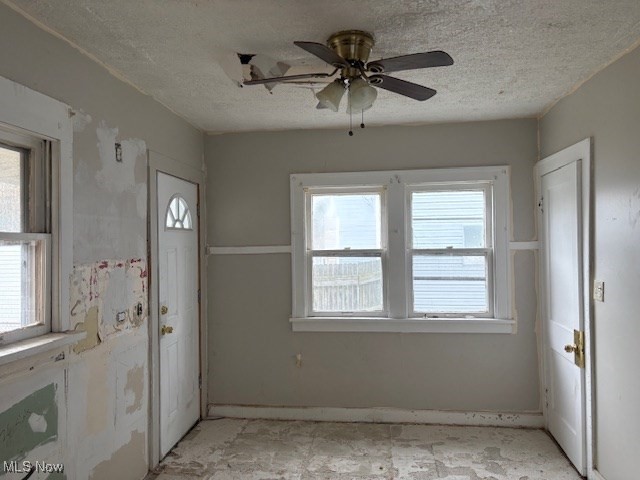 3288 Cedarbrook Road Cleveland, OH 44118 - Photo 8 of 18 Entrance foyer with ceiling fan and a textured ceiling