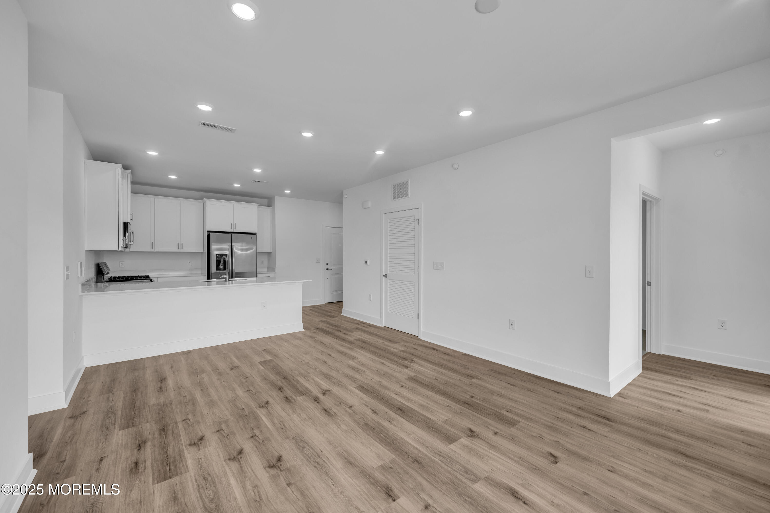 28311 Radford Court, Unit 2829 Monroe Township, NJ 08831 - Photo 16 of 29 a view of kitchen with wooden floor