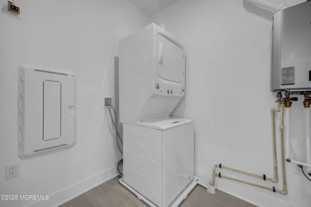 a utility room with cabinets