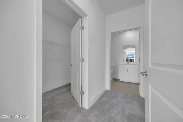 a view of entryway with bathroom