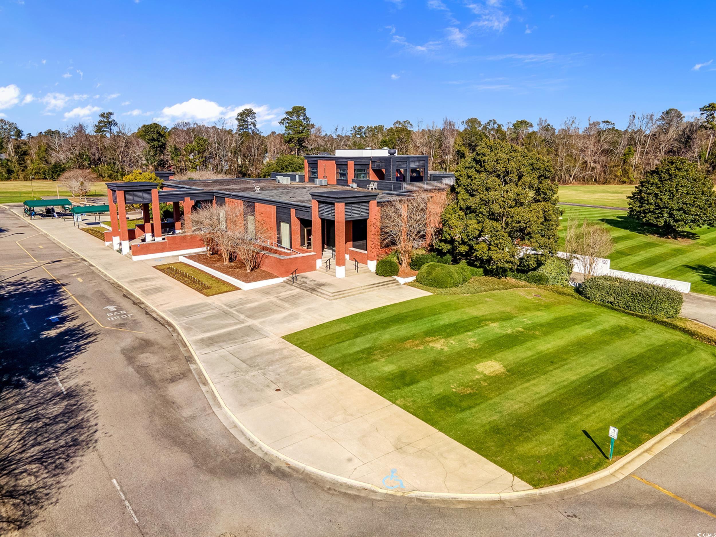 322 Kiskadee Loop, Unit 12E Conway, SC 29526 - Photo 20 of 36 Bird's eye view of a tree filled landscape