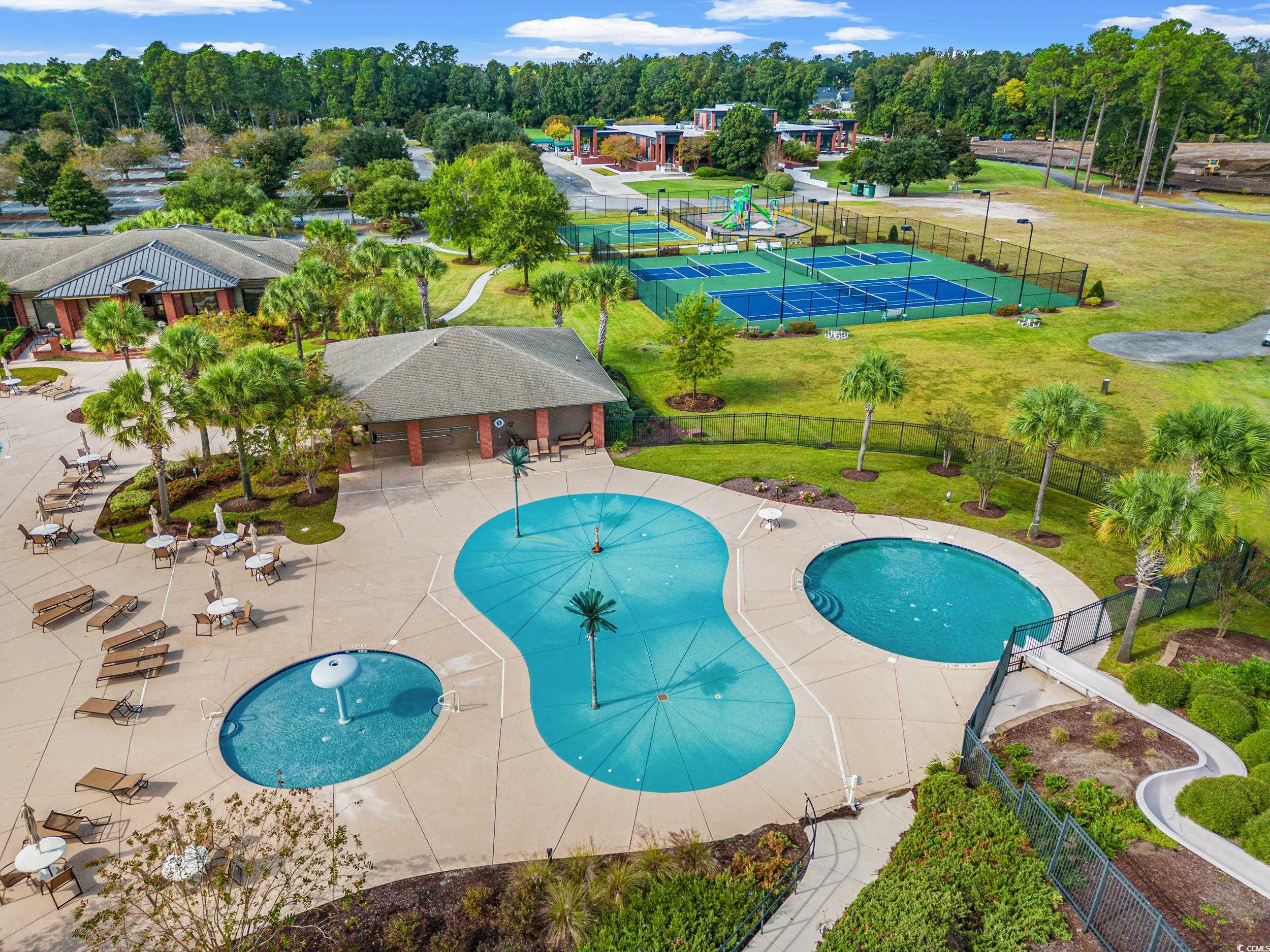 322 Kiskadee Loop, Unit 12E Conway, SC 29526 - Photo 23 of 36 Community pool with a patio