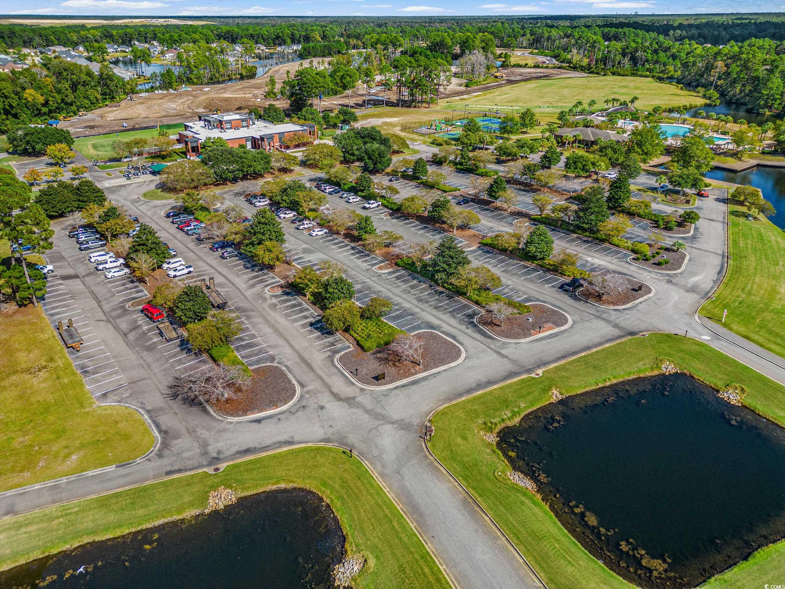 322 Kiskadee Loop, Unit 12E Conway, SC 29526 - Photo 32 of 36 Aerial view of property's location featuring a nearby body of water