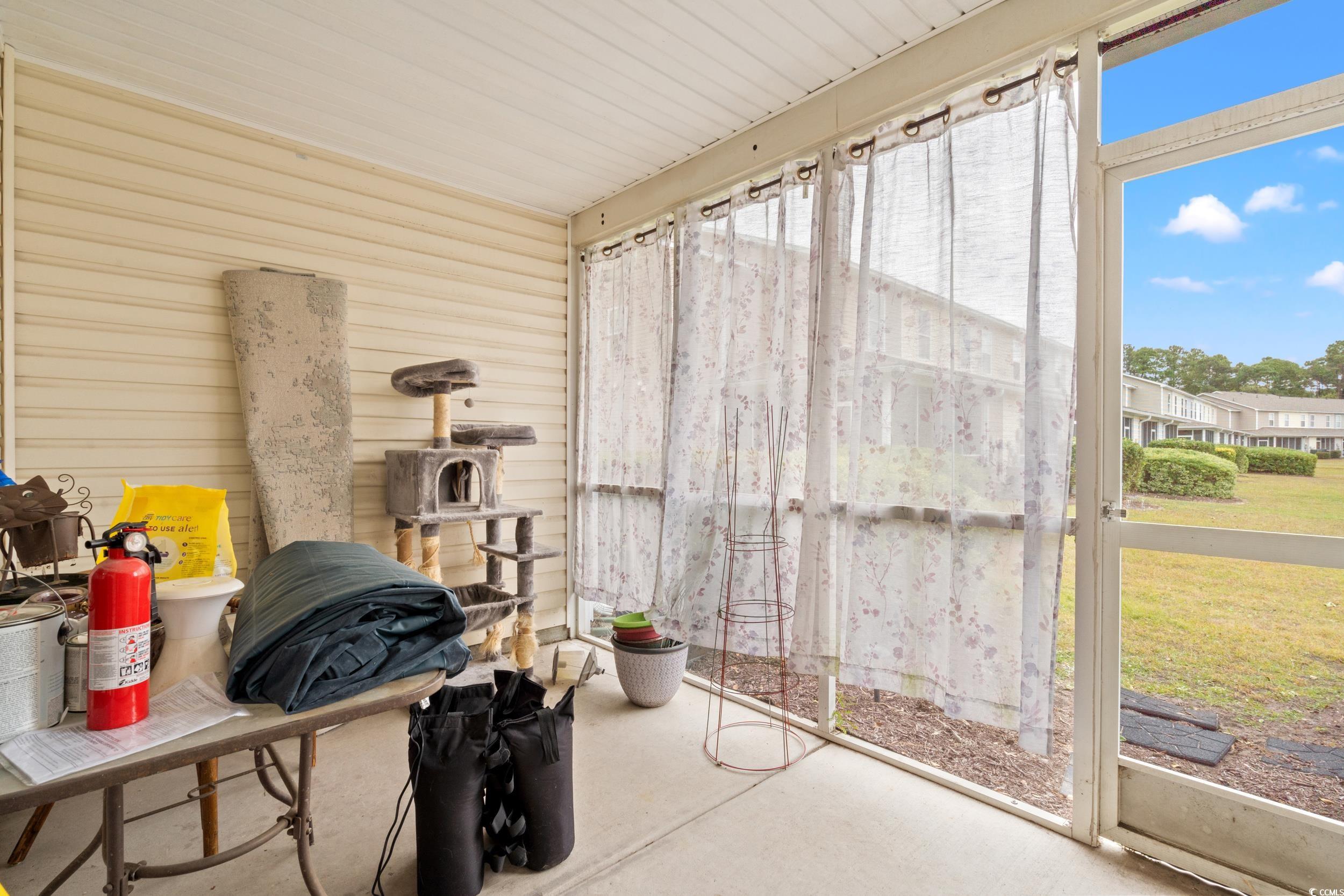 322 Kiskadee Loop, Unit 12E Conway, SC 29526 - Photo 10 of 36 View of sunroom