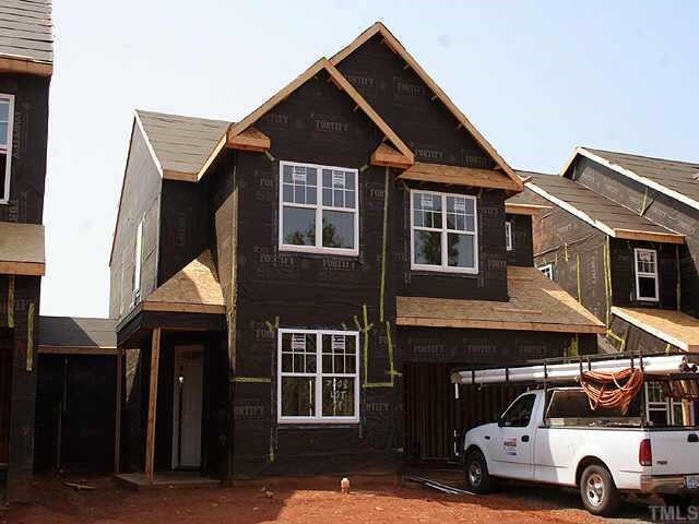7608 Cagle Drive Raleigh, NC 27617 - Photo 1 of 1 a car parked in front of a house