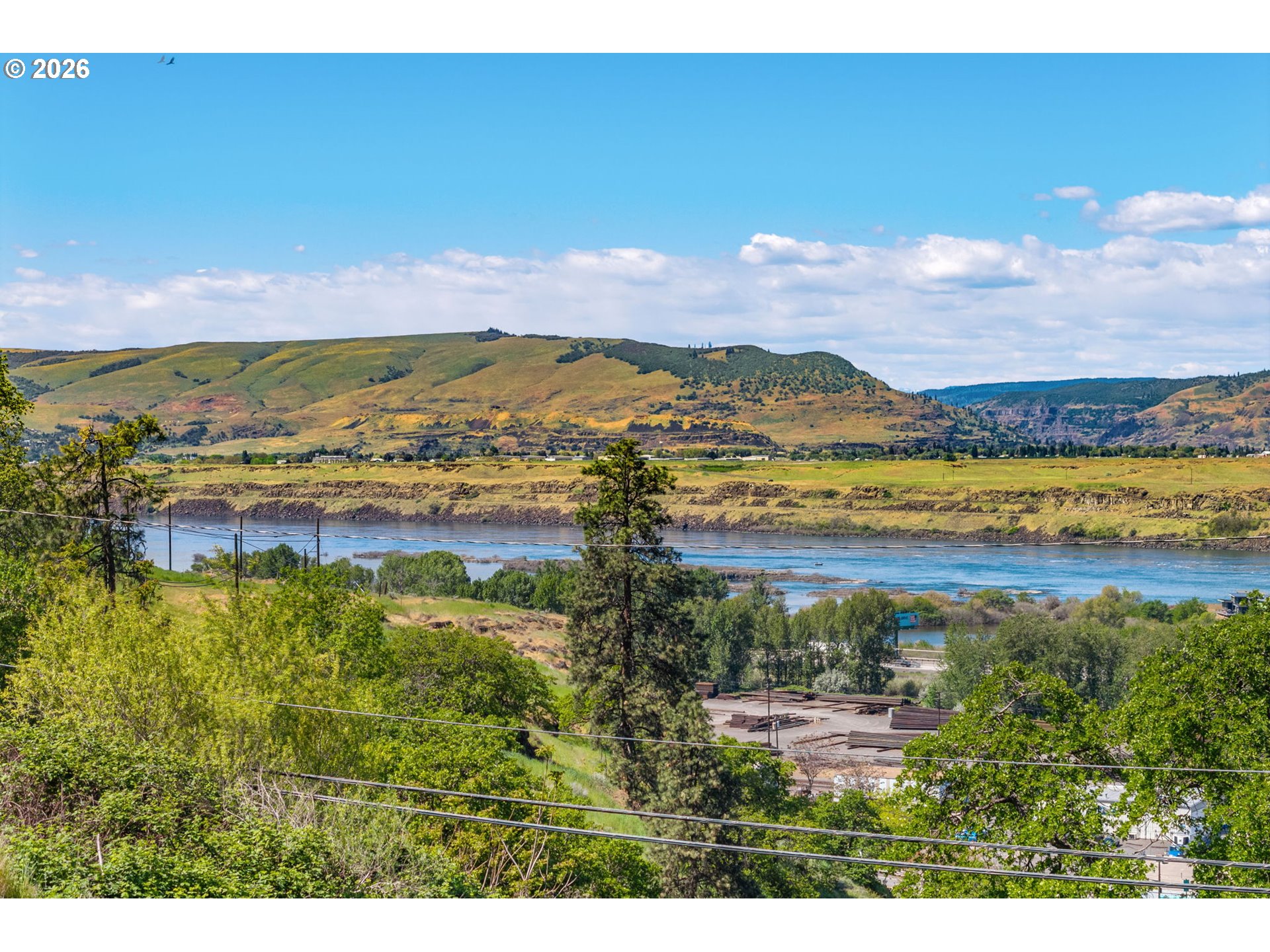 0 Fremont Street The Dalles, OR 97058 - Photo 2 of 16 a view of a lake with a mountain