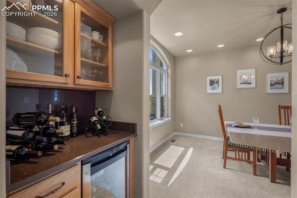 a kitchen with stainless steel appliances granite countertop a sink and cabinets