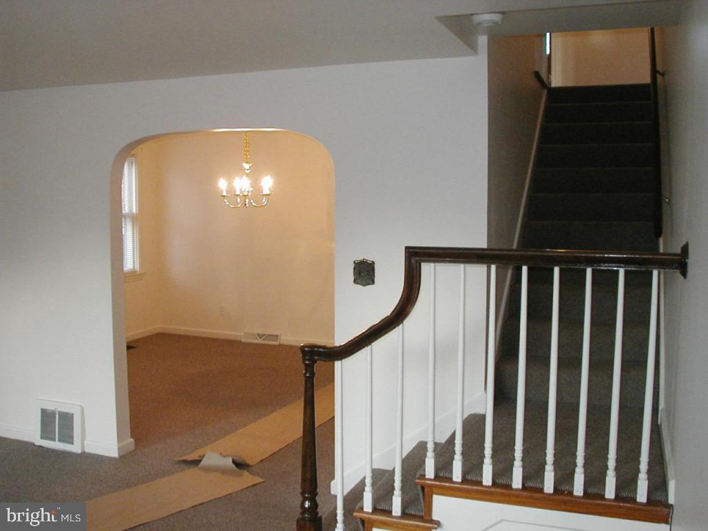 425 South Cedar Street Lititz, PA 17543 - Photo 5 of 16 a view of staircase with railing and white walls