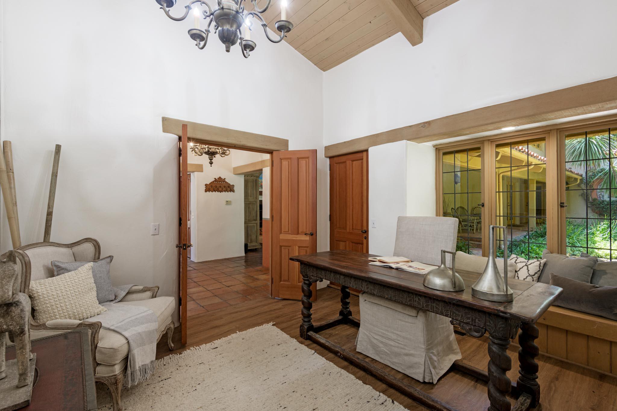 601 San Ysidro Road Santa Barbara, CA 93108 - Photo 12 of 31 a view of a workspace with furniture and a window