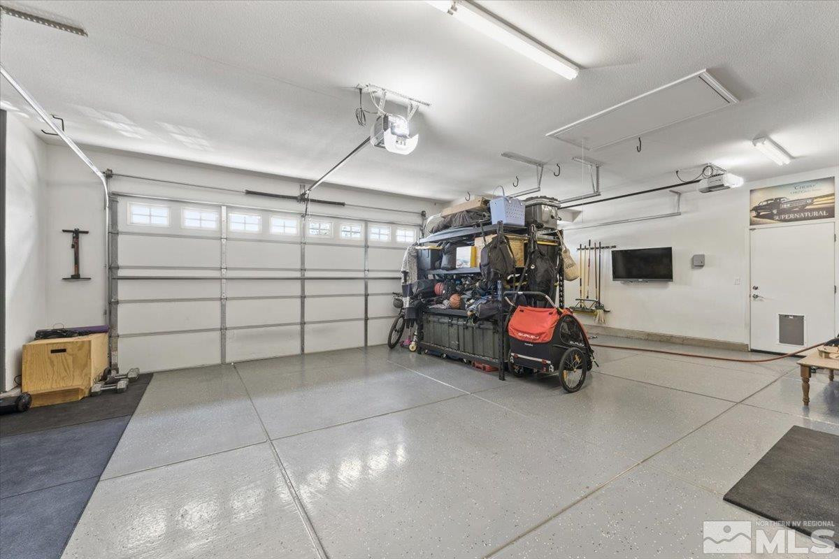 2265 Renzo Way Reno, NV 89521 - Photo 18 of 24 a view of a garage with parked cars