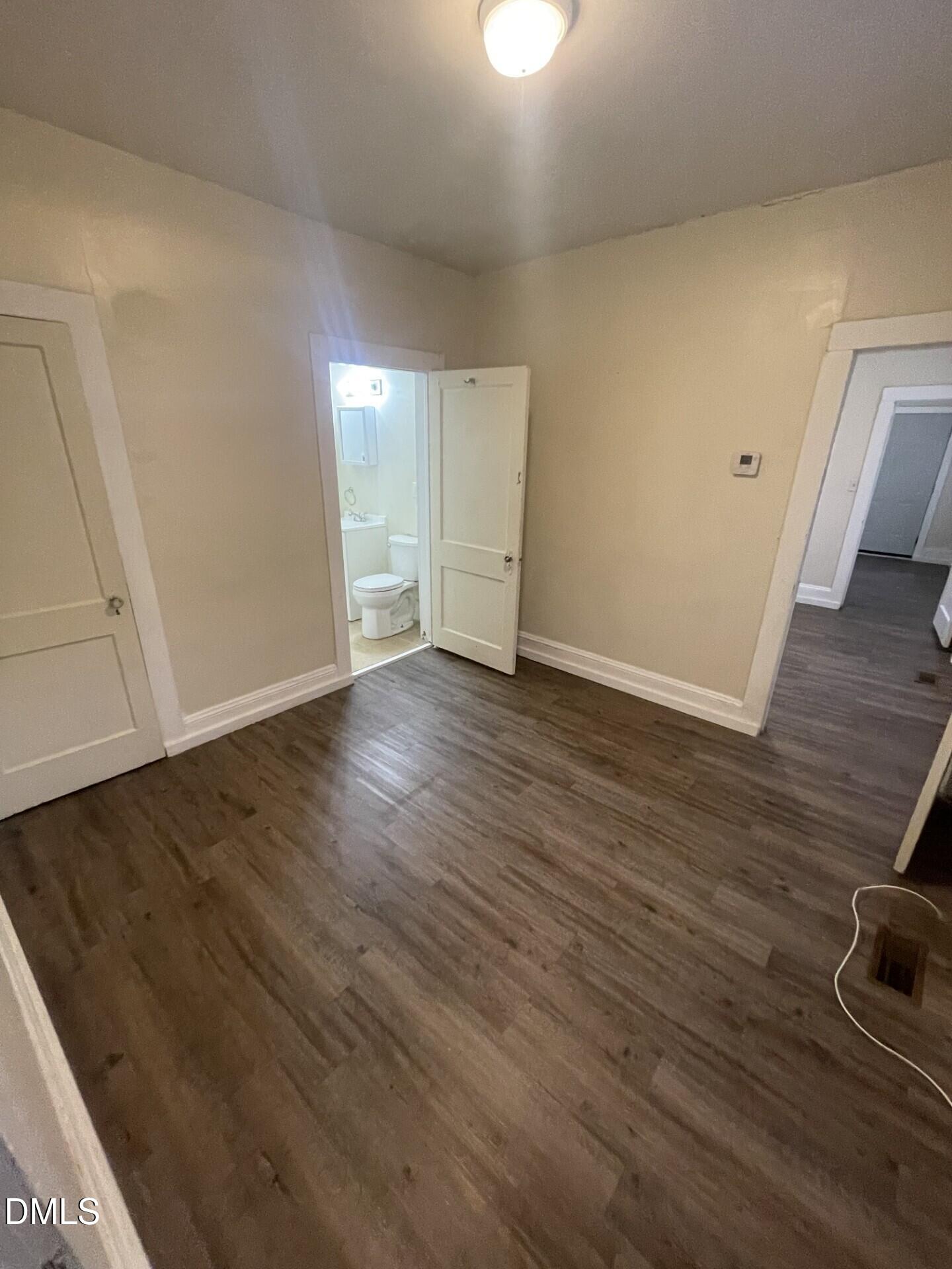 305 Kennedy Street Raleigh, NC 27610 - Photo 11 of 13 wooden floor in an empty room