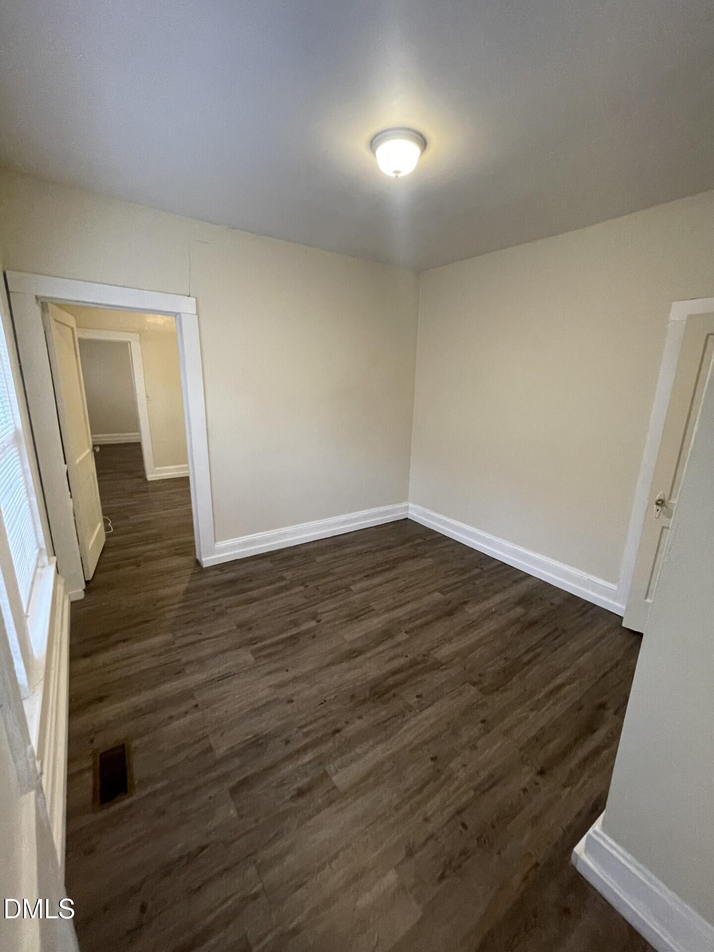 305 Kennedy Street Raleigh, NC 27610 - Photo 12 of 13 wooden floor in an empty room