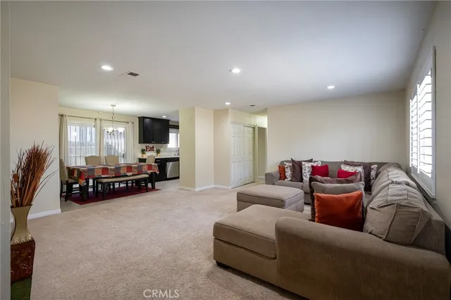 a living room with furniture and a couch
