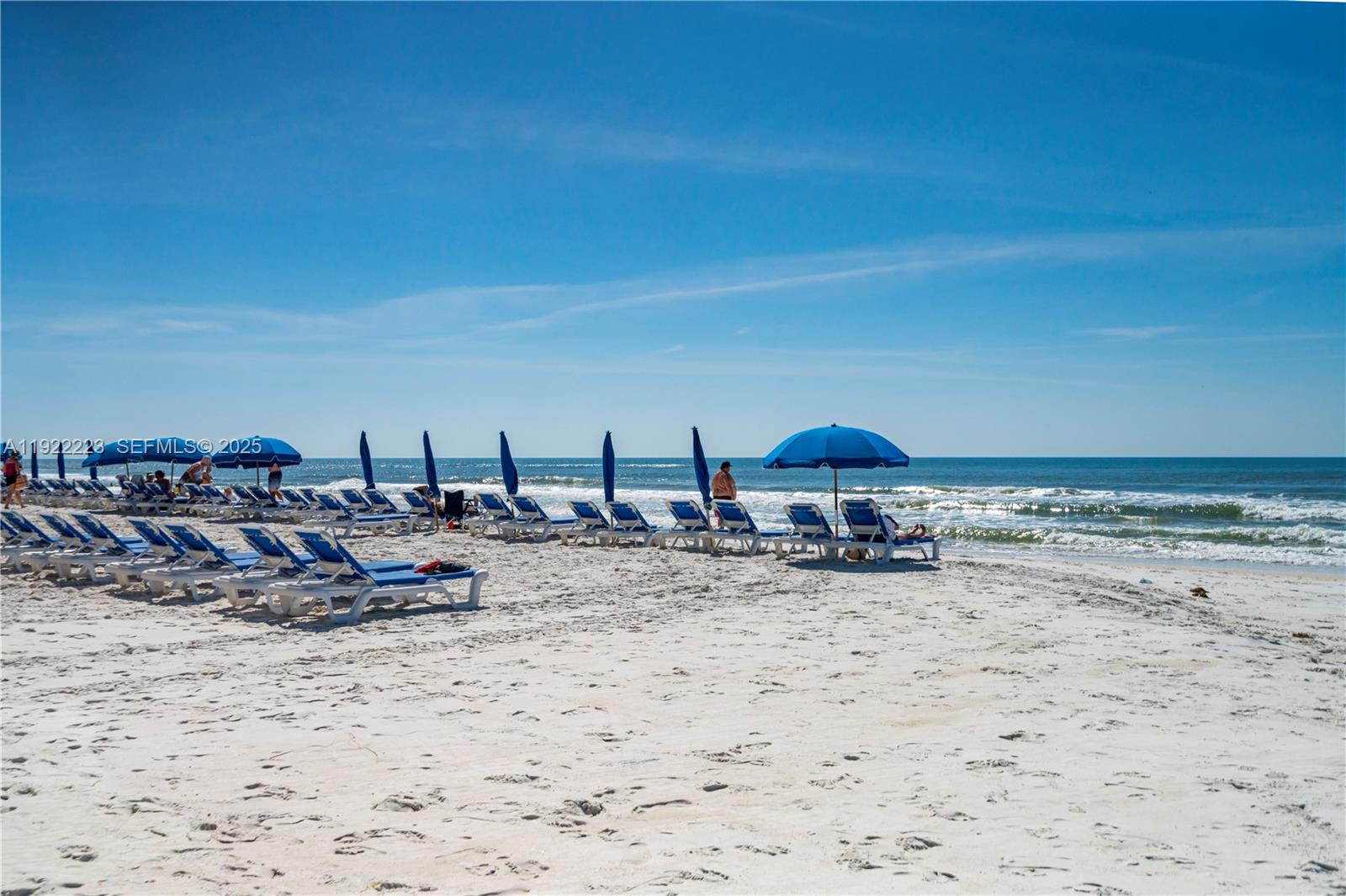 17784 Front Beach Road, Unit 10 Panama City, FL 32413 - Photo 11 of 12 a view of a lake with a beach