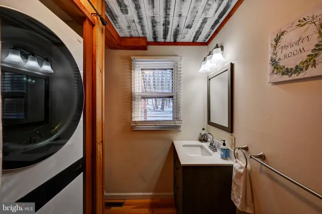 a room with furniture and a flat screen tv