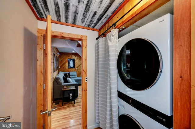 a view of a livingroom with furniture and window