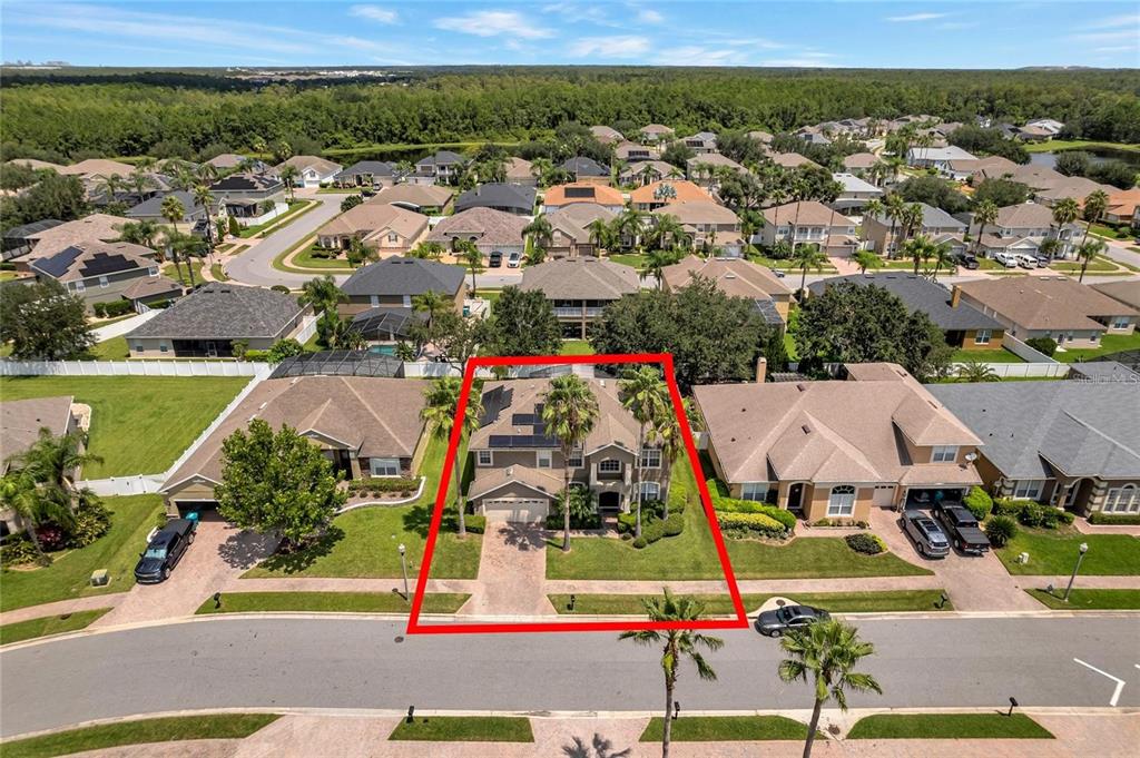 10023 Ians Ridge Road Orlando, FL 32832 - Photo 58 of 60 an aerial view of residential houses with outdoor space