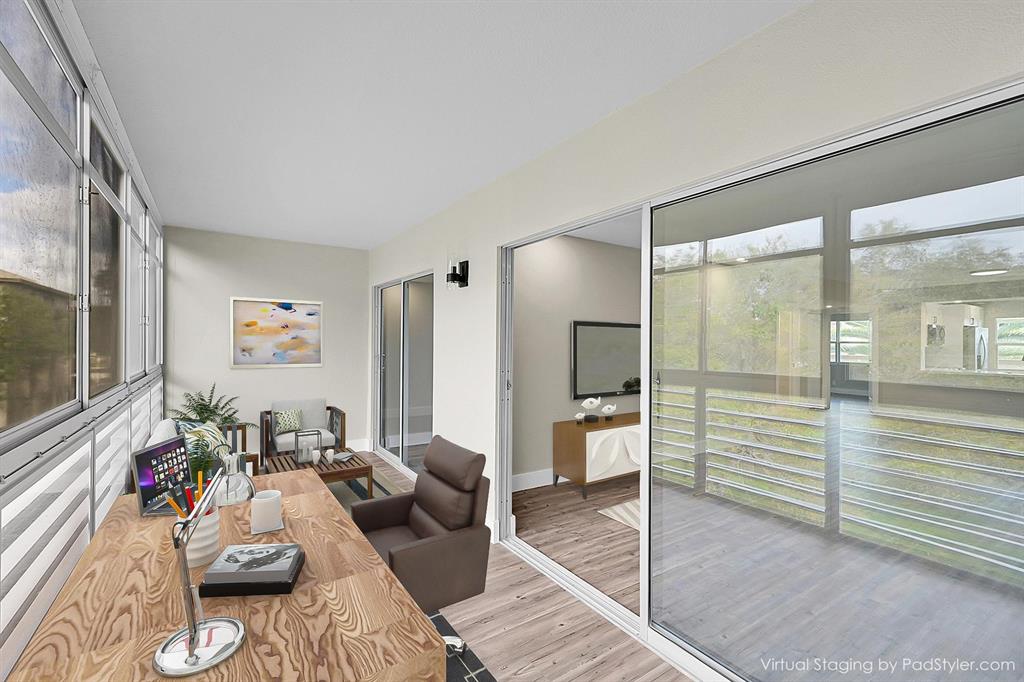Lucaya Village Condominiums Coconut Creek, FL 33066 - Photo 16 of 28 a living room with furniture and a flat screen tv