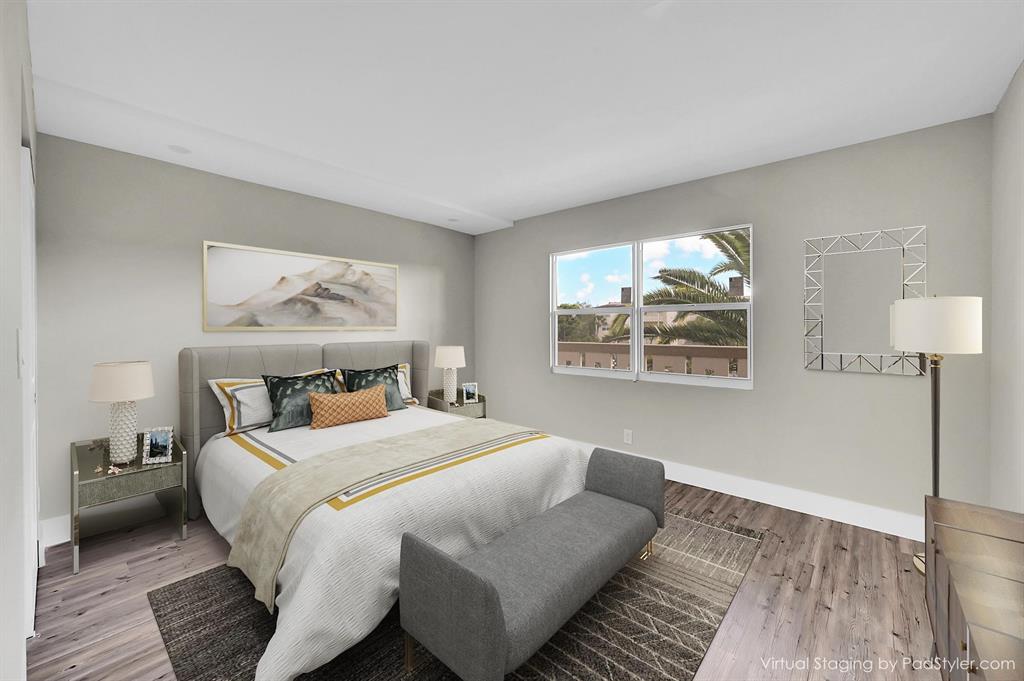 Lucaya Village Condominiums Coconut Creek, FL 33066 - Photo 17 of 28 a bedroom with a bed and a window