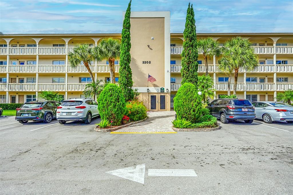 Lucaya Village Condominiums Coconut Creek, FL 33066 - Photo 28 of 28 a view of a cars parked in front of a building