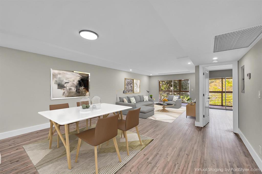 Lucaya Village Condominiums Coconut Creek, FL 33066 - Photo 6 of 28 a view of a dining room with furniture and wooden floor