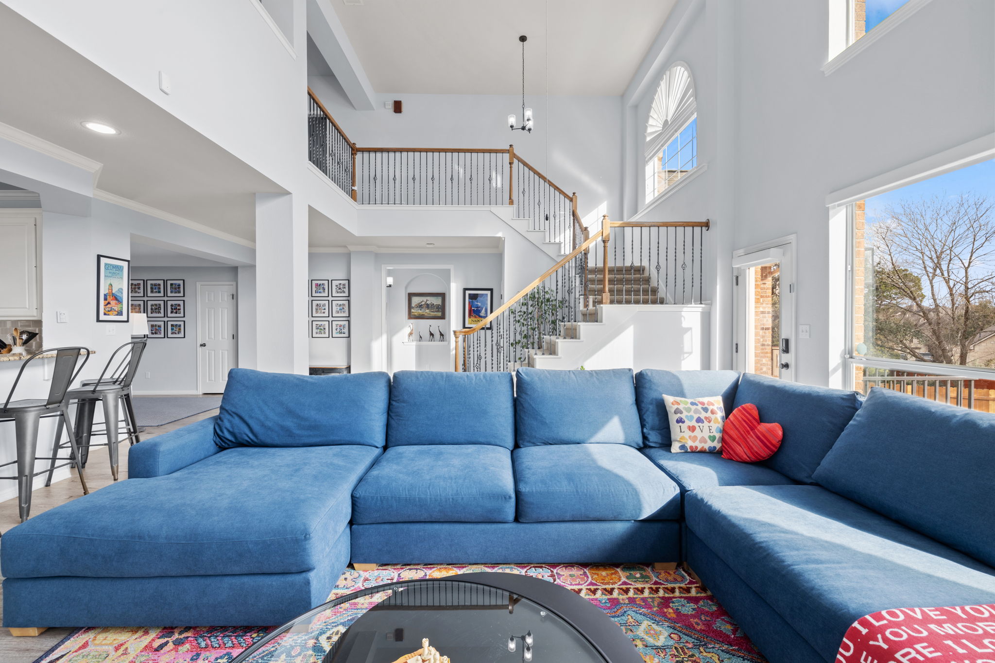 136 Eaton Lane Austin, TX 78737 - Photo 15 of 40 a living room with furniture and a large window