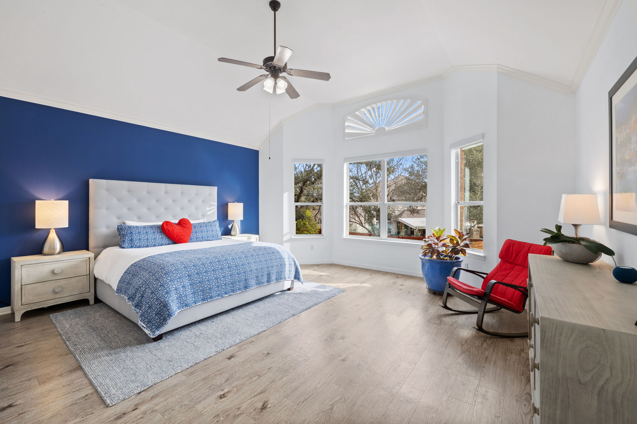 136 Eaton Lane Austin, TX 78737 - Photo 20 of 40 a living room with furniture and a chandelier