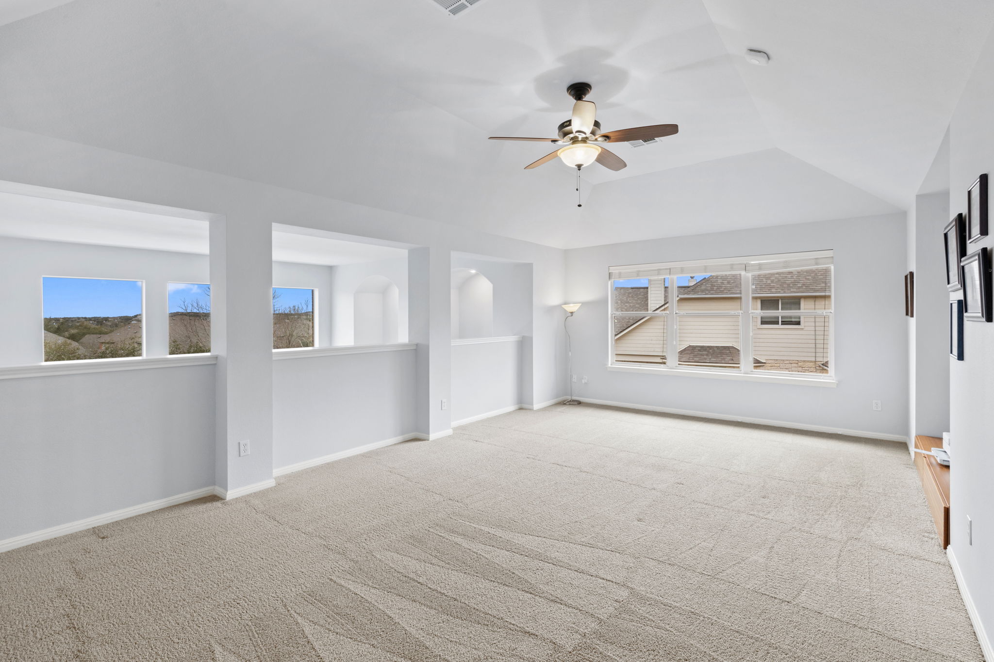 136 Eaton Lane Austin, TX 78737 - Photo 30 of 40 a view of an empty room with a window