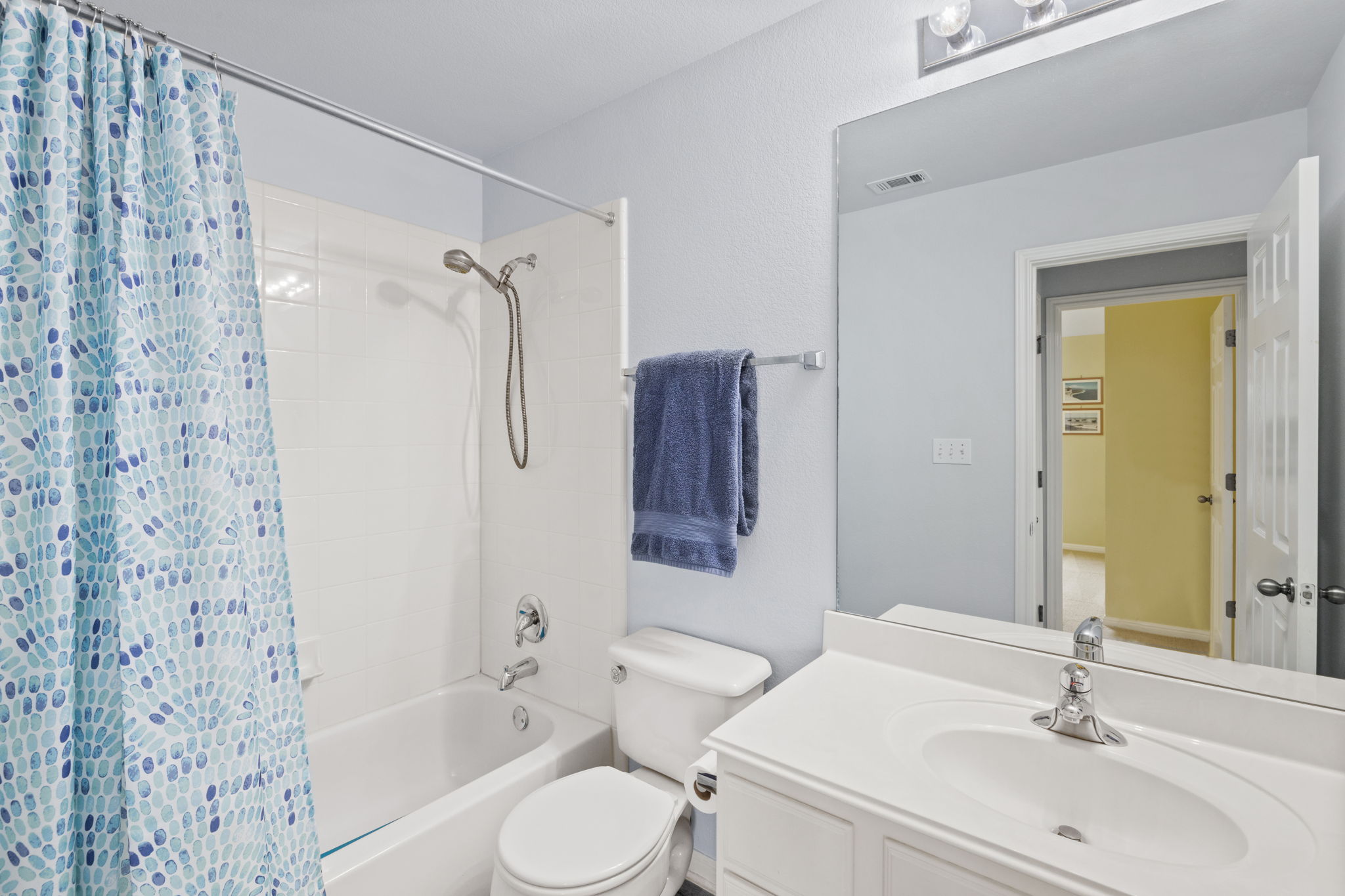 136 Eaton Lane Austin, TX 78737 - Photo 32 of 40 a bathroom with a sink toilet and shower