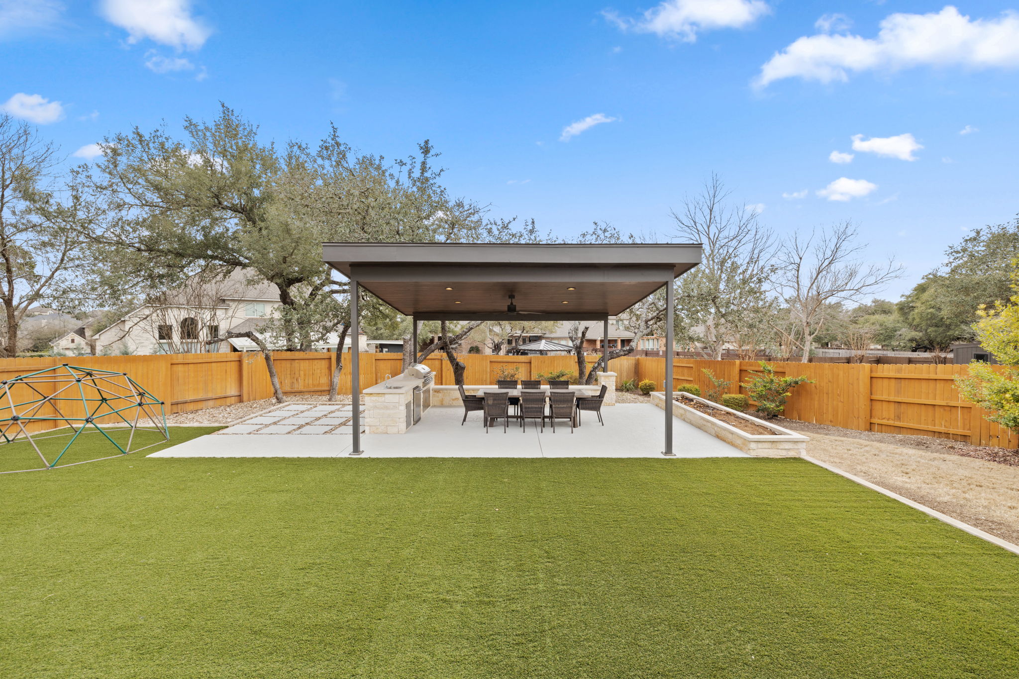136 Eaton Lane Austin, TX 78737 - Photo 40 of 40 a view of a swimming pool with an outdoor seating