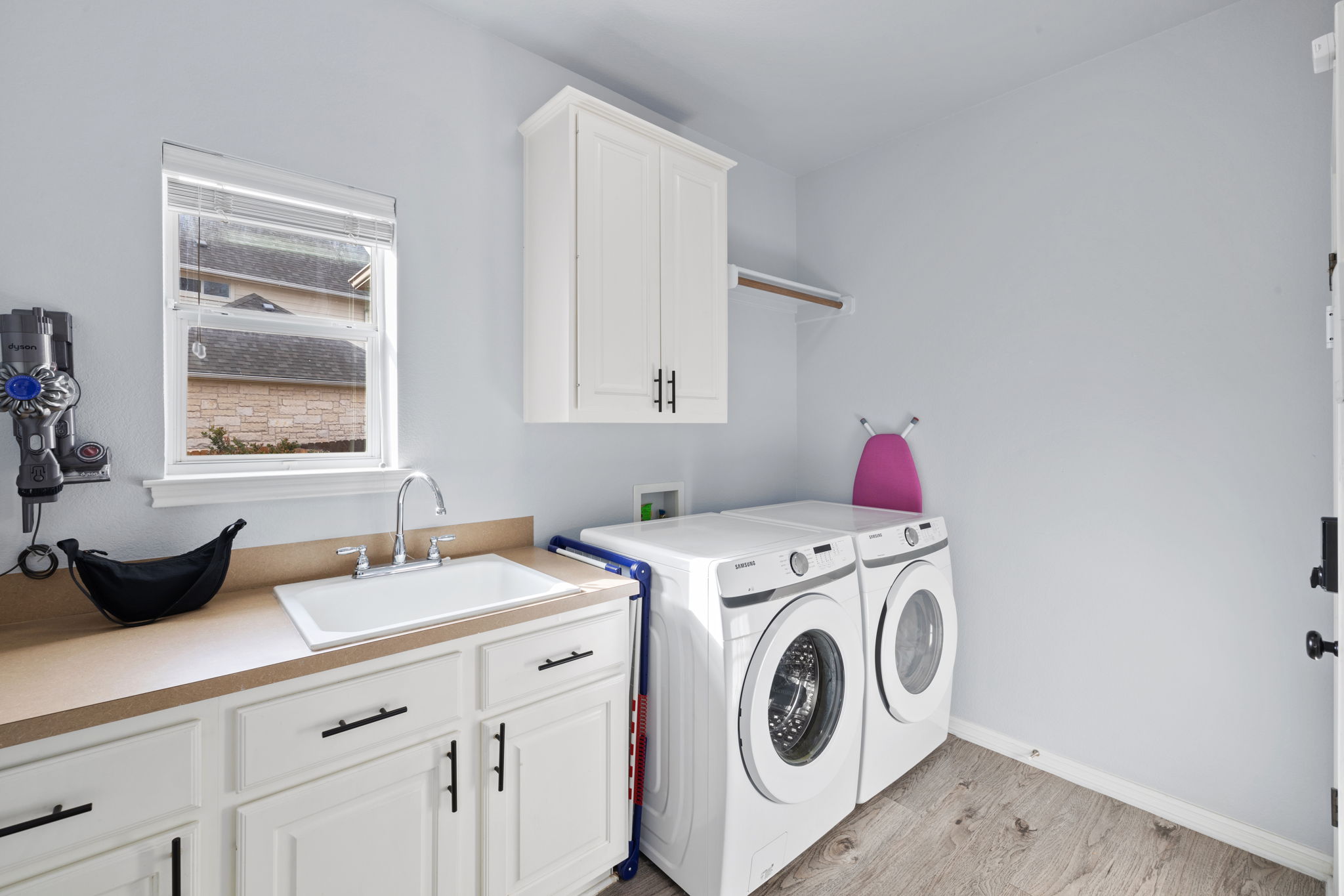 136 Eaton Lane Austin, TX 78737 - Photo 9 of 40 a utility room with dryer and washer