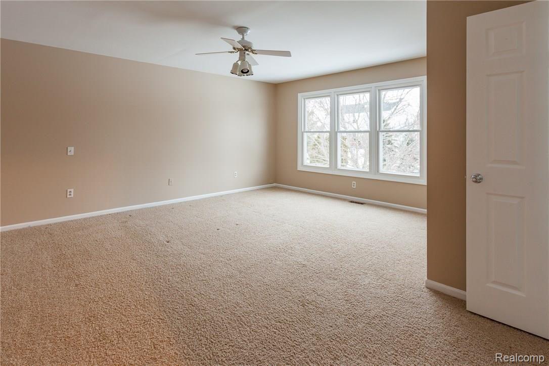 2360 Millbrook Court Rochester, MI 48306 - Photo 15 of 25 Master Bedroom with ceiling fan