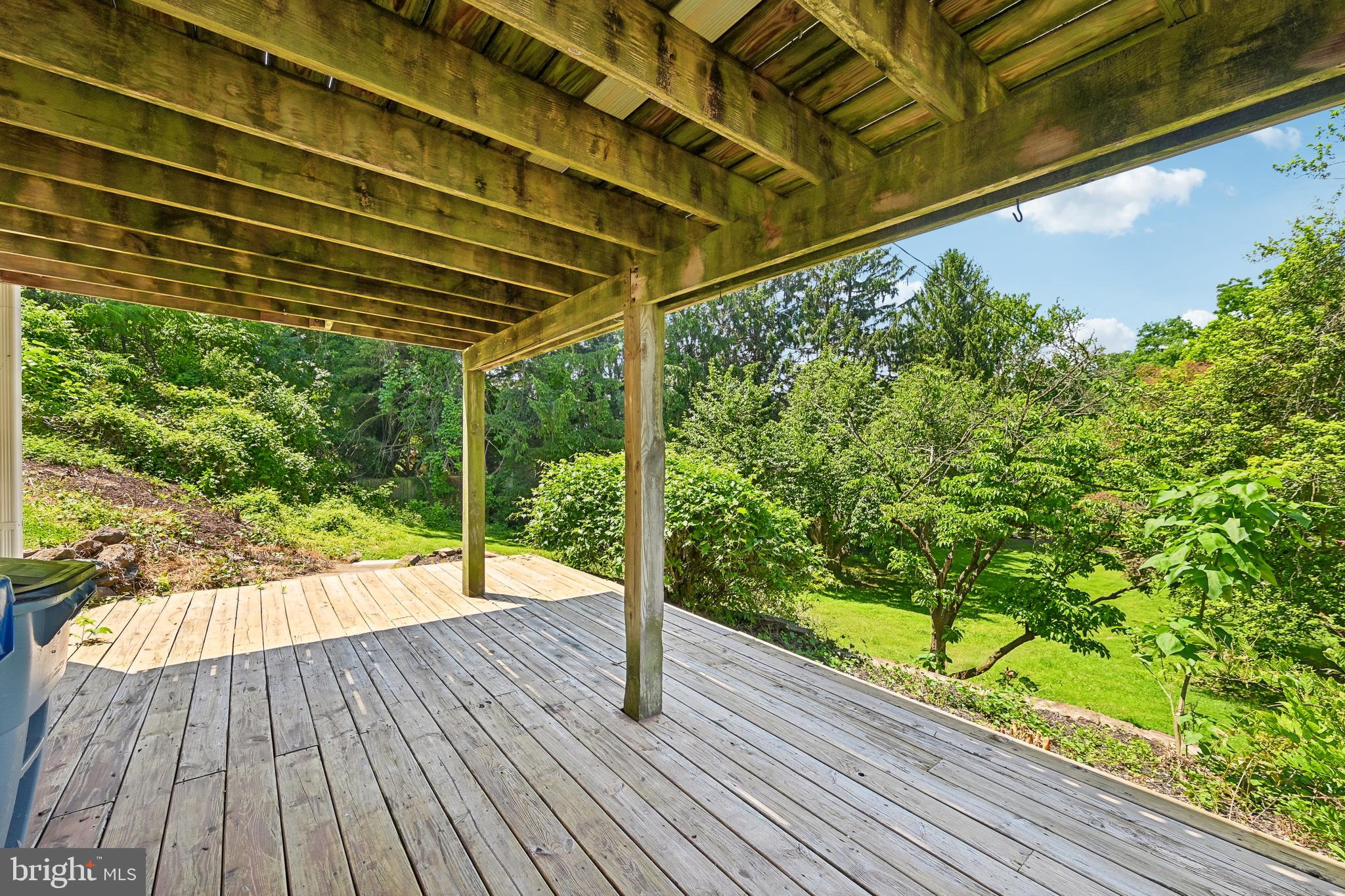 5702 Falls Road Baltimore, MD 21209 - Photo 38 of 49 a view of porch with wooden floor