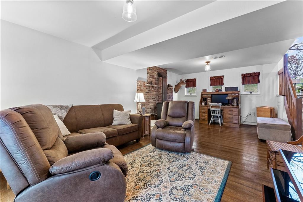 1257 Highway 989 Rochester, PA 15074 - Photo 20 of 40 a living room with furniture and a wooden floor