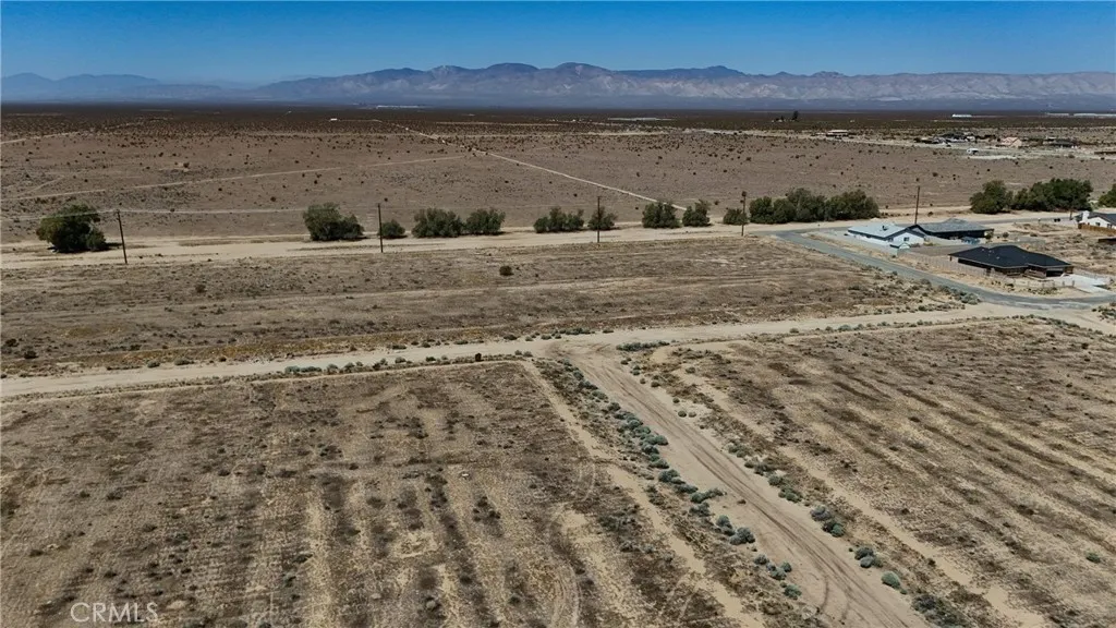 742 71st Street Edwards, CA 93523 - Photo 4 of 8 Red boundary lines on pictures are an estimate and for marketing purposes only. Buyer to verify all aspects of this property including, but not limited to utilities, assessments, boundaries, usage, access, and zoning to satisfy themselves.