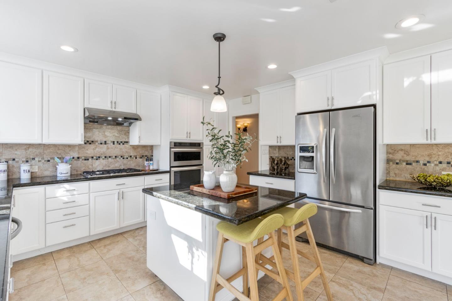 618 Azule Avenue San Jose, CA 95123 - Photo 12 of 48 a kitchen with stainless steel appliances granite countertop a refrigerator and a stove top oven